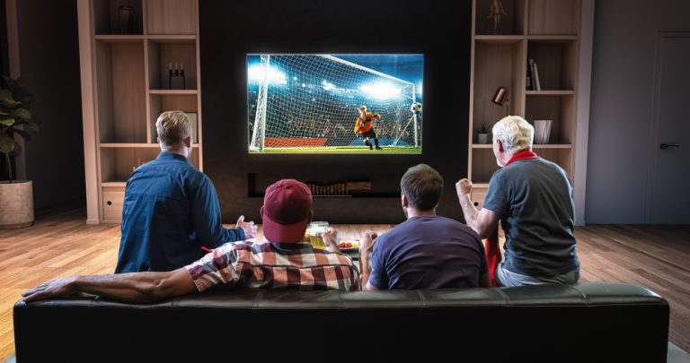 Group,Of,Fans,Are,Watching,A,Soccer,Moment,On,The